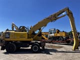 2006 Komatsu PW220MH material handler, side profile view