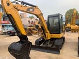 2023 Caterpillar 306D mini excavator, front three-quarter view