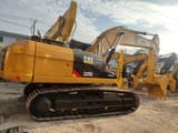 Caterpillar 325D crawler excavator, rear three-quarter view