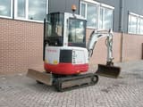 2012 Takeuchi TB23R mini excavator, front three-quarter view