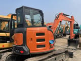 2021 Hitachi ZX55 mini excavator, rear three-quarter view
