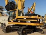 1996 Caterpillar 325BL crawler excavator, side view