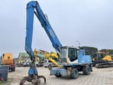 2003 Fuchs MHL340 material handler, side view