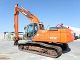 2010 Doosan 828-II crawler excavator, rear three-quarter view