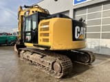 2015 Caterpillar 320EL crawler excavator, rear three-quarter view