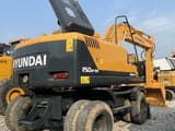 2022 Hyundai 150W-9S wheel excavator rear three-quarter view