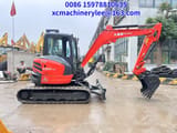 2023 Kubota KX057-4 mini excavator, side view