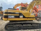 Caterpillar 320BL crawler excavator, side view
