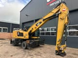2015 Caterpillar MH3022 material handler, side view