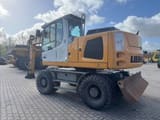 2013 Liebherr A916 wheel excavator, rear three-quarter view