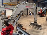 2023 Takeuchi TB235-2 mini excavator boom and bucket view