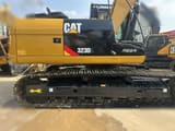 2023 Caterpillar 323DL crawler excavator side view
