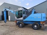 2010 Fuchs MHL 331 material handler side view
