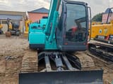 2020 Kobelco SK75 mini excavator, front view with blade