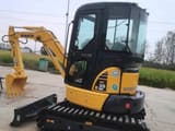 2023 Komatsu PC35MR mini excavator, front three-quarter view