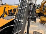 Hyundai R220LC-9S crawler excavator boom and hydraulic lines
