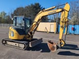 2016 Komatsu PC55MR-3 mini excavator, side view