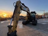 2010 Caterpillar 319DL crawler excavator, front three-quarter view