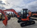 2024 Kubota U55-4 mini excavator, side profile view