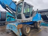 2006 Fuchs MHL350C material handler, front three-quarter view