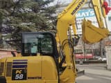 2025 Komatsu PC58 mini excavator side view