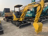 2023 Komatsu PC30MR-3 mini excavator, front three-quarter view