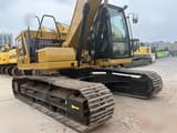 2018 Caterpillar 320 crawler excavator, rear three-quarter view