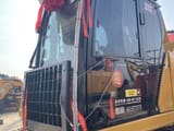 2024 Caterpillar 323 crawler excavator cab view