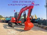2023 Kubota 55U mini excavator, front three-quarter view