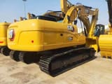 2026 Caterpillar 320GX crawler excavator, rear three-quarter view