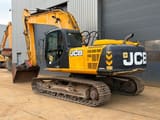 2015 JCB JS220 crawler excavator, rear three-quarter view