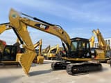 2012 Caterpillar 325DL crawler excavator, side view
