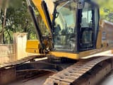 2022 Caterpillar 333 crawler excavator, side view of cab and tracks