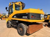 2006 Caterpillar M322C wheel excavator, rear three-quarter view
