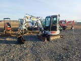 2009 Bobcat 428EG mini excavator, front three-quarter view