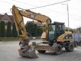 Pelle sur roues Caterpillar M313C de 2003