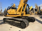 2010 Caterpillar 320BL crawler excavator, side view