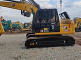 Caterpillar 312D2GC crawler excavator, side profile view