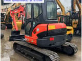 2021 Kubota U55-5 mini excavator, rear three-quarter view