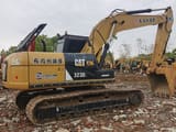 2020 Caterpillar 323DL crawler excavator, rear three-quarter view