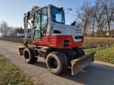 2020 Takeuchi TB295W wheel excavator, front three-quarter view