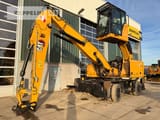 2020 Caterpillar MH3022-06C material handler, side profile view