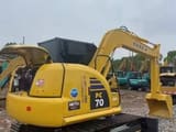 2023 Komatsu PC70-8 mini excavator, rear three-quarter view