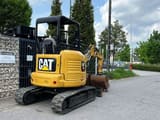 2018 Caterpillar 303E mini excavator, rear three-quarter view