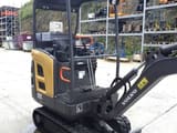 2015 Volvo EC15C mini excavator, side view