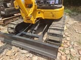 2023 Komatsu PC35 Mini Excavator front view with blade