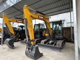 2026 XCMG XE60G mini excavator, front three-quarter view