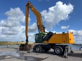 2012 Fuchs MHL380D material handler, side view