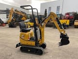 2021 Caterpillar 300.9D mini excavator, side view