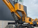 2015 Liebherr LH 50 material handler, low angle side view